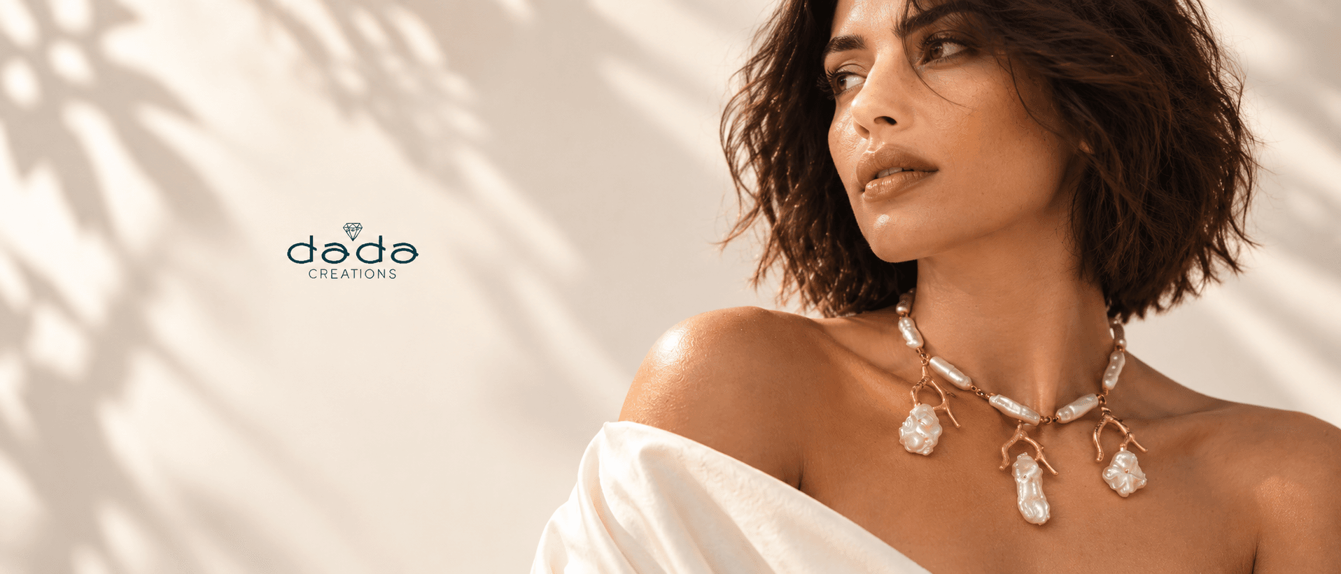 Dada Creations : un collier aux branches dorées et aux perles lumineuses